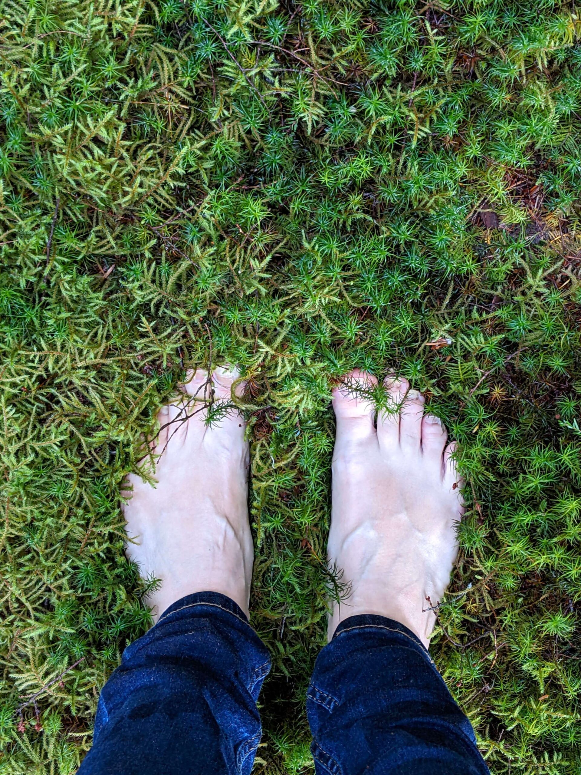 Bare feet in moss